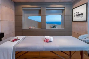 Beauty room with massage table - Scott Free -  Yacht for Sale - Torrens Luxury Collection